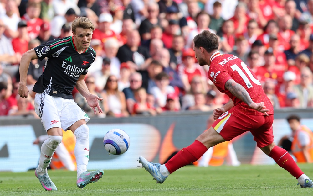 Arsenal reage no segundo tempo e arranca empate com o campeão Liverpool em Anfield